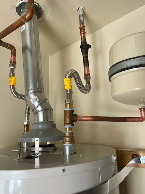 Water heater installation and plumbing repair in Colony Ln